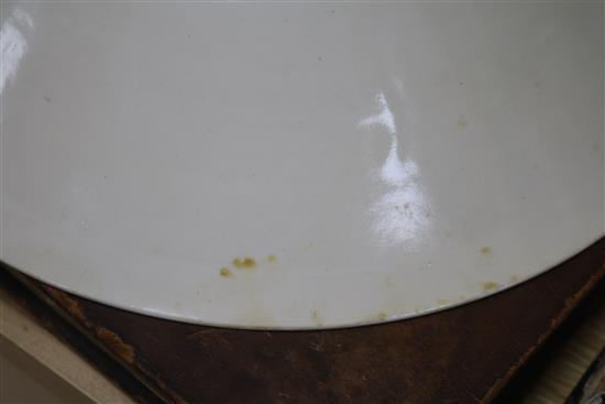 A Chinese cream glazed bowl on stand